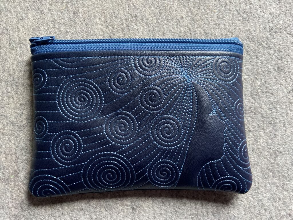 Small embroidered zipper bag-Swirly Hair