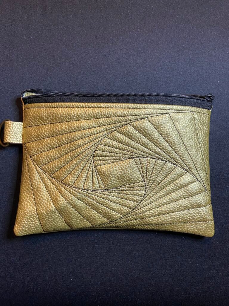 Embroidered Zipper Bag-Gold with black spiral squares