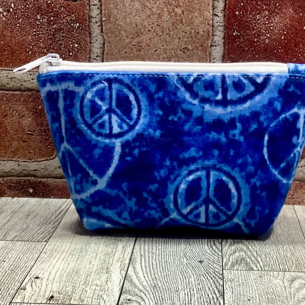 Small Zip Bag Blue Peace Signs